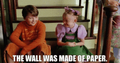 Boy And Girl Sitting On Stairs Saying The Wall Was Made Of Paper GIF