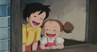 Boy And Girl Smiling From Doorway GIF