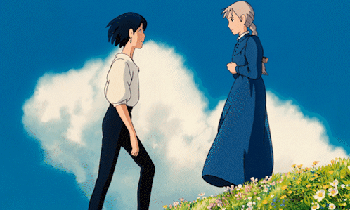Boy And Girl Standing In Field GIF