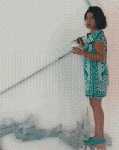 Boy And Girl Standing In Front Of Building With Zhut GIF