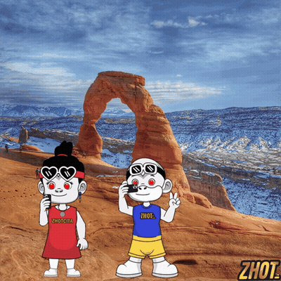 Boy And Girl Standing In Front Of Rock Formation Saying Zhout GIF