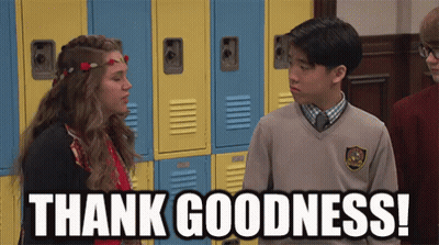 Boy And Girl Standing In Front Of School Lockers Saying Thank Goodness GIF