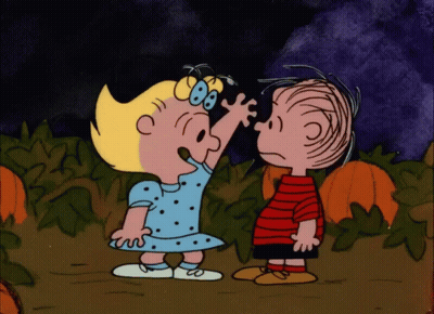 Boy And Girl Standing In Pumpkin Field GIF