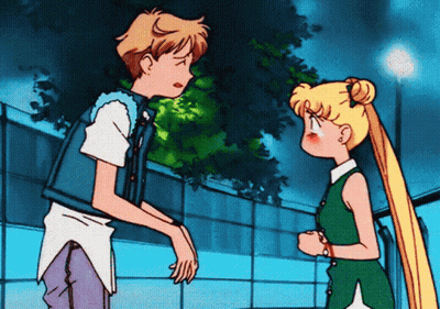 Boy And Girl Standing Next To Each Other GIF