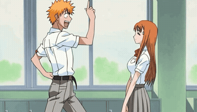 Boy And Girl Standing Together With Letter O On Shirt GIF