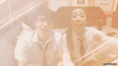 Boy And Girl Standing With Mouths Open GIF