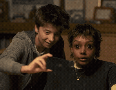 Boy And Girl Taking Selfie GIF