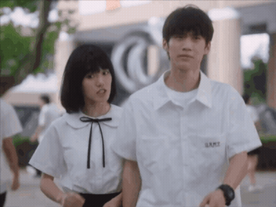 Boy And Girl With Shirt Saying LRMZ GIF