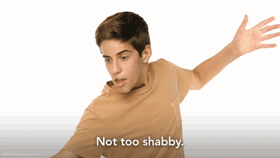 Boy Arms Outstretched Saying Not Too Shabby GIF
