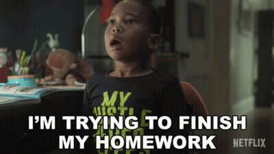 Boy At Desk Says I'm Trying To Finish My Homework On Netflix GIF