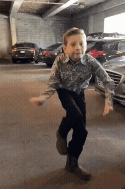 Boy Dancing In Parking Garage GIF