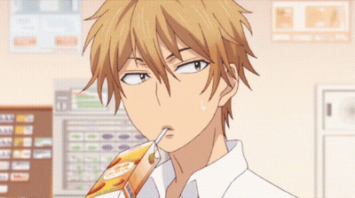 Boy Drinking From Orange Carton GIF
