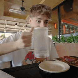 Boy Drinking Water Slowly On Glass GIF