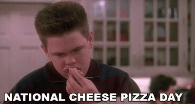 Boy Eating Pizza In Restaurant GIF