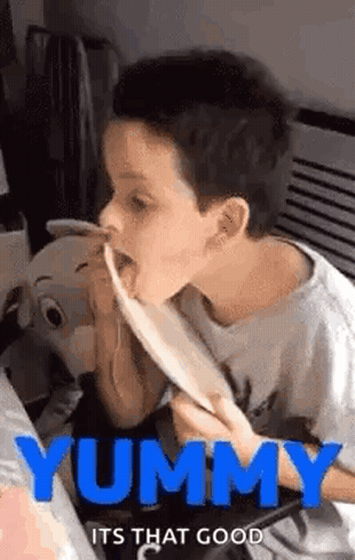 Boy Eating Spaghetti With Tongue Out GIF