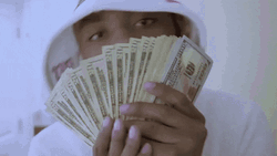 Boy Flexing His Dollar Bills To Camera GIF