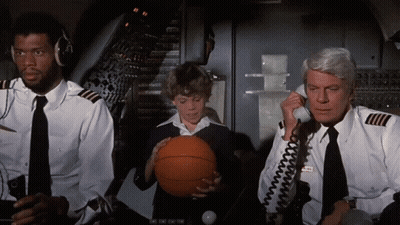 Boy Holding Basketball Talks On Phone GIF
