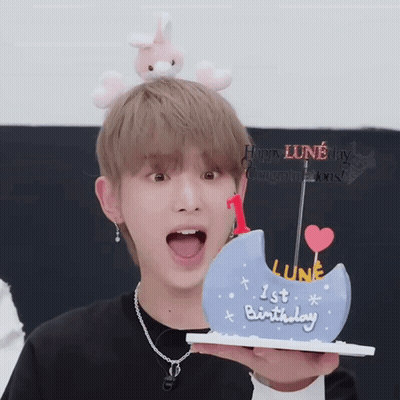 Boy Holding Cake Saying Lune GIF
