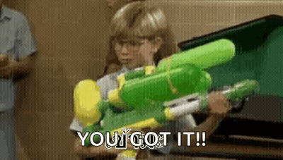 Boy Holding Green Water Gun GIF