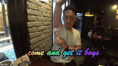 Boy Holding Hose In Grass GIF
