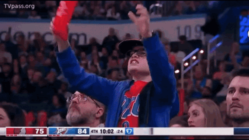 Boy Holding Red Bottle Watching Basketball GIF