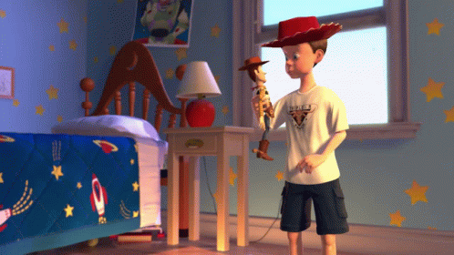 Boy Holding Woody Doll In Bedroom With Stars GIF