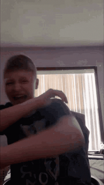 Boy In Abercrombie & Fitch Shirt Laughing GIF