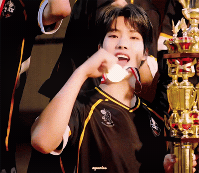Boy In Black And Yellow Shirt Saying Aquarius GIF