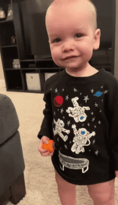 Boy In Black Astronaut Shirt GIF