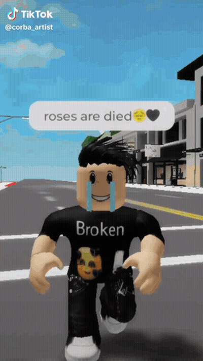 Boy In Black Shirt Saying Broken Walking Down Street GIF