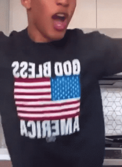Boy In Black Shirt With American Flag Saying God GIF