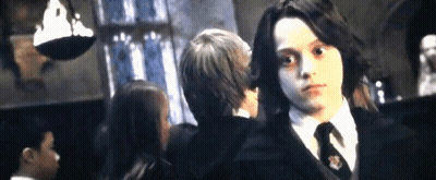 Boy In Black Suit And Tie With Another Boy GIF