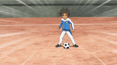 Boy In Blue And White Jacket With Soccer Ball GIF