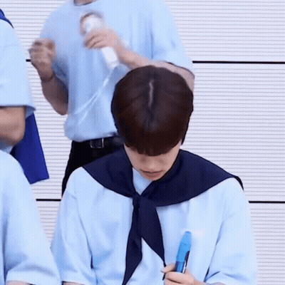 Boy In Blue Beret Sitting Next To Boy In Blue Shirt GIF