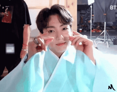 Boy In Blue Kimono Making Peace Sign GIF
