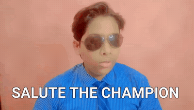 Boy In Blue Shirt And Sunglasses Says Salute The Champion GIF
