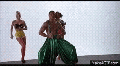 Boy In Blue Shirt And White Shorts Jumping GIF