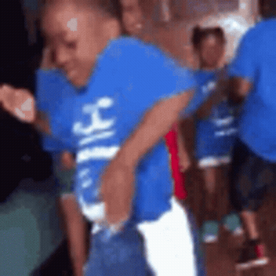 Boy In Blue Shirt Dancing With Group GIF