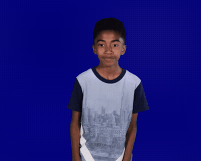 Boy in Blue Shirt Making Funny Face Saying What