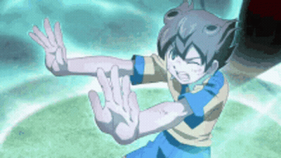 Boy in Blue Shirt Making Stop Sign With Hands