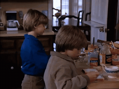 Boy In Blue Shirt Next To Another Boy With Zico Chips GIF