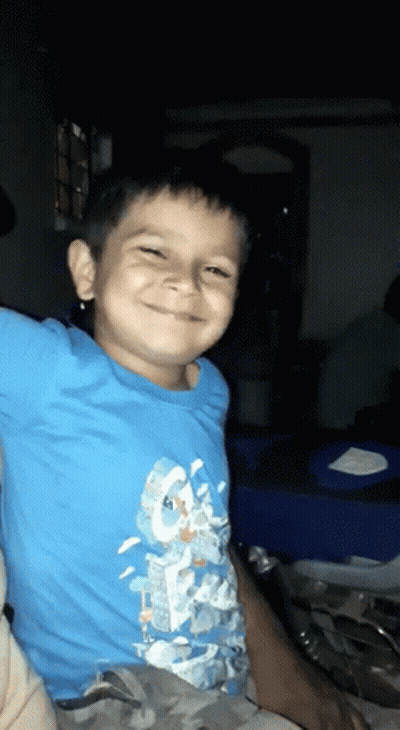 Boy In Blue Shirt Smiling GIF