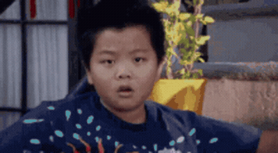 Boy In Blue Shirt Surprised GIF