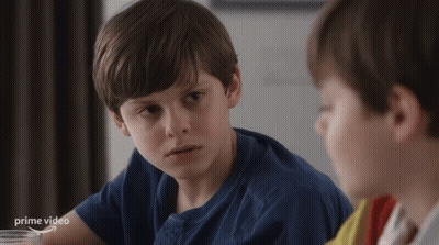Boy In Blue Shirt Talking To Friend GIF