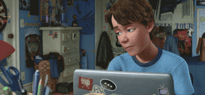 Boy In Blue Shirt Using Laptop With Play Tour Poster GIF