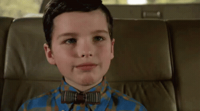 Boy In Bow Tie Smiling GIF