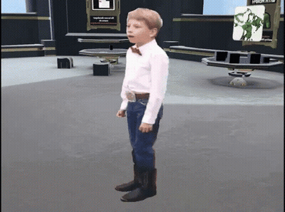 Boy In Bow Tie Standing In Room GIF