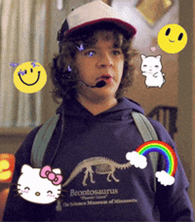 Boy In Brontosaurus Sweatshirt With Hello Kitty And Rainbow GIF