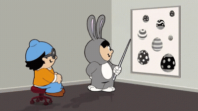 Boy In Bunny Costume Pointing At Eggs GIF