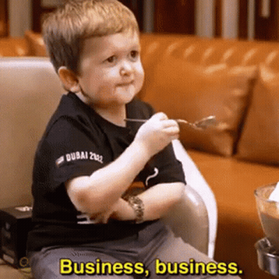 Boy In Chair With Spoon Saying Business Business GIF